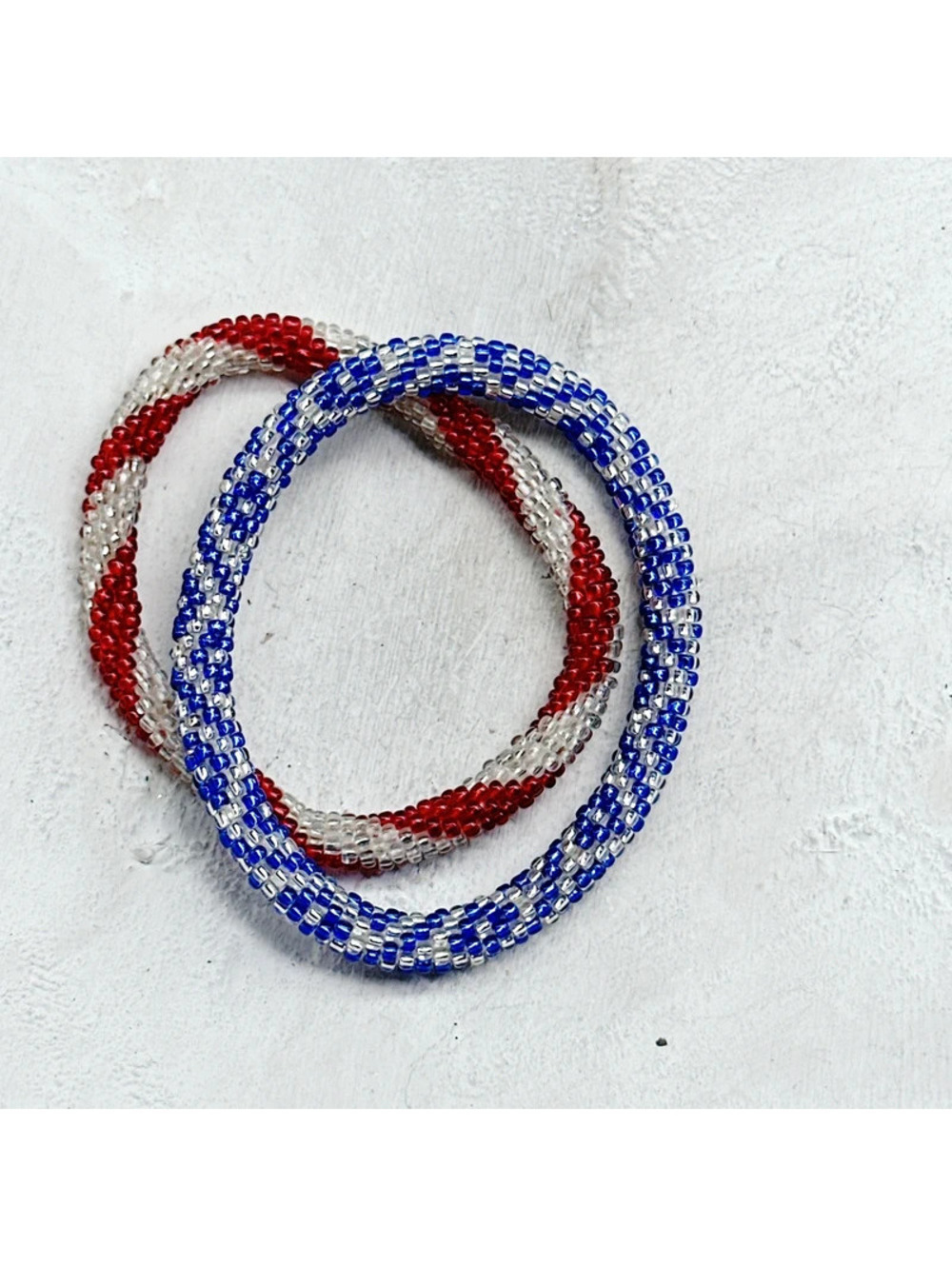 487mc. Red and Blue Seed Bead Bracelets